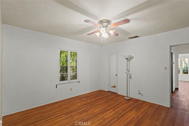 733 W 24th St, San Bernardino, CA 92405 - unfurnished room featuring wood finished floors and ceiling fan