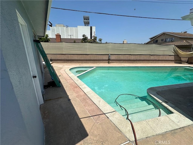 17321 Merit Ave, Gardena, CA 90247 - view of swimming pool featuring a fenced backyard and a pool with connected hot tub