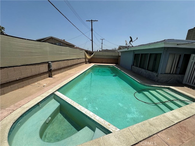 17321 Merit Ave, Gardena, CA 90247 - view of swimming pool with a fenced backyard and a pool with connected hot tub