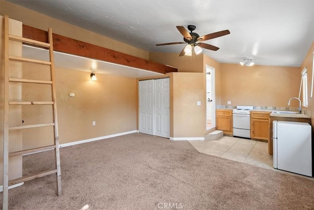 553 Well Rd, Templeton, CA 93465 - kitchen with white appliances, light colored carpet, a ceiling fan, and light tile patterned flooring