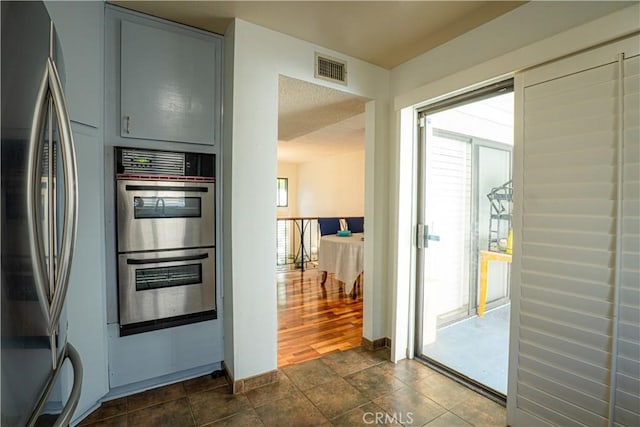 9620 Sepulveda Blvd Unit 4, North Hills, CA 91343 - kitchen featuring stainless steel appliances and gray cabinetry