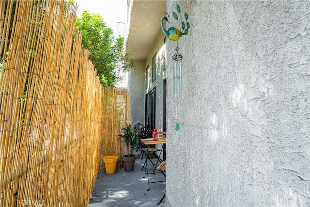 9620 Sepulveda Blvd Unit 4, North Hills, CA 91343 - view of side of property featuring stucco siding