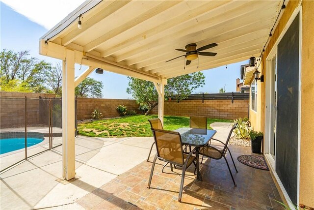43145 62nd St W, Lancaster, CA 93536 - fenced backyard with outdoor dining area, a patio, and ceiling fan