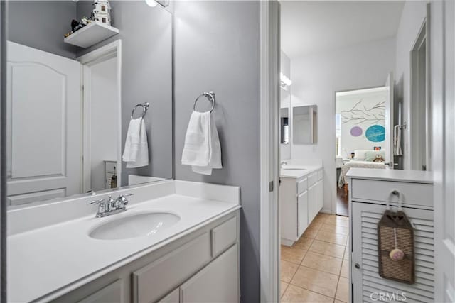 43145 62nd St W, Lancaster, CA 93536 - ensuite bathroom with two vanities and tile patterned floors