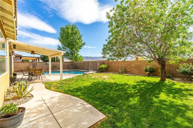 43145 62nd St W, Lancaster, CA 93536 - fenced backyard featuring a patio