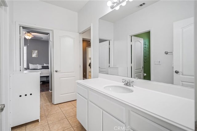 43145 62nd St W, Lancaster, CA 93536 - bathroom featuring vanity, connected bathroom, and tile patterned flooring