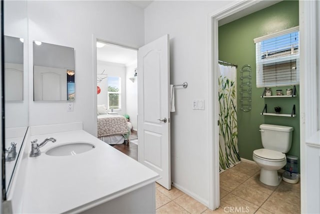 43145 62nd St W, Lancaster, CA 93536 - ensuite bathroom with vanity, tile patterned flooring, and curtained shower