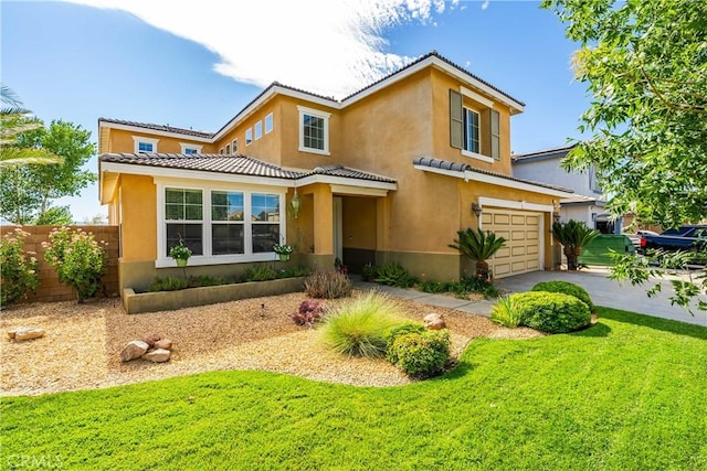 43145 62nd St W, Lancaster, CA 93536 - view of front of house with an attached garage, stucco siding, a tiled roof, and driveway