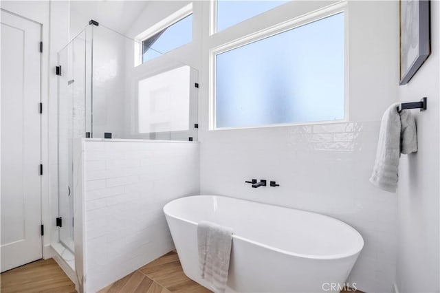 2102 Marshallfield Ln Unit B, Redondo Beach, CA 90278 - bathroom with a freestanding tub, a stall shower, and tile walls