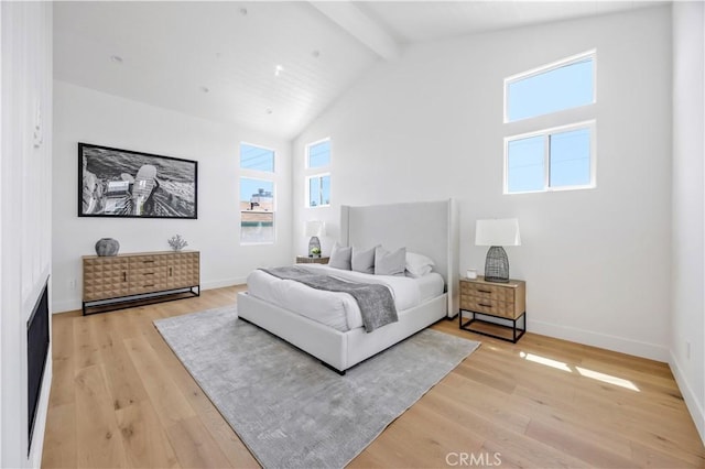 2102 Marshallfield Ln Unit B, Redondo Beach, CA 90278 - bedroom featuring beamed ceiling, light wood-style flooring, and high vaulted ceiling
