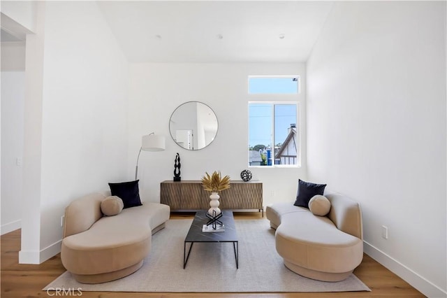 2102 Marshallfield Ln Unit B, Redondo Beach, CA 90278 - sitting room featuring baseboards and wood finished floors