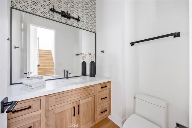 2102 Marshallfield Ln Unit B, Redondo Beach, CA 90278 - half bathroom with vanity and wood finished floors