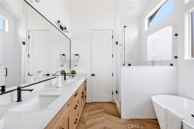 2102 Marshallfield Ln Unit B, Redondo Beach, CA 90278 - bathroom with double vanity, a stall shower, healthy amount of natural light, and a soaking tub