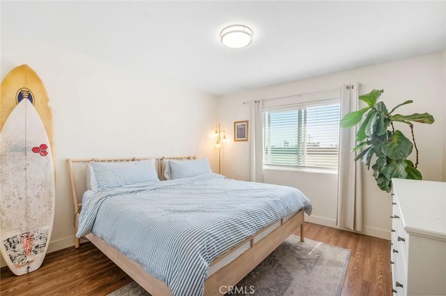 631 7th St Unit 11, Imperial Beach, CA 91932 - bedroom featuring wood finished floors and baseboards