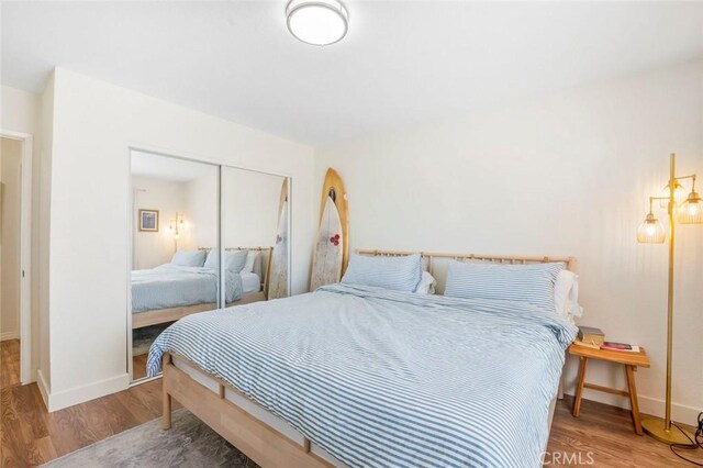 631 7th St Unit 11, Imperial Beach, CA 91932 - bedroom featuring wood finished floors and a closet