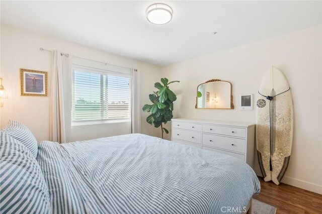631 7th St Unit 11, Imperial Beach, CA 91932 - bedroom featuring wood finished floors and baseboards