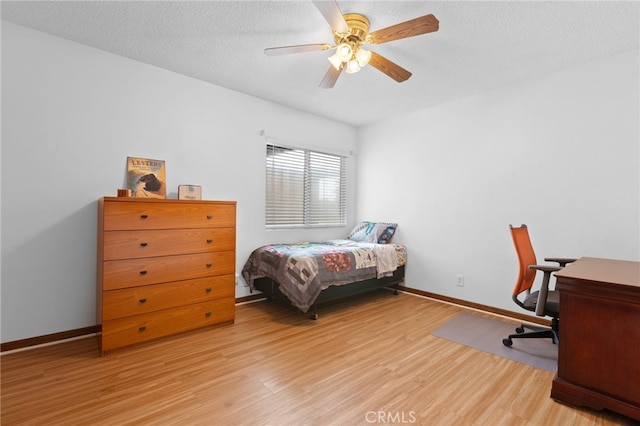 1907 W 235th Pl, Torrance, CA 90501 - bedroom with wood finished floors, a ceiling fan, a textured ceiling, and an office area