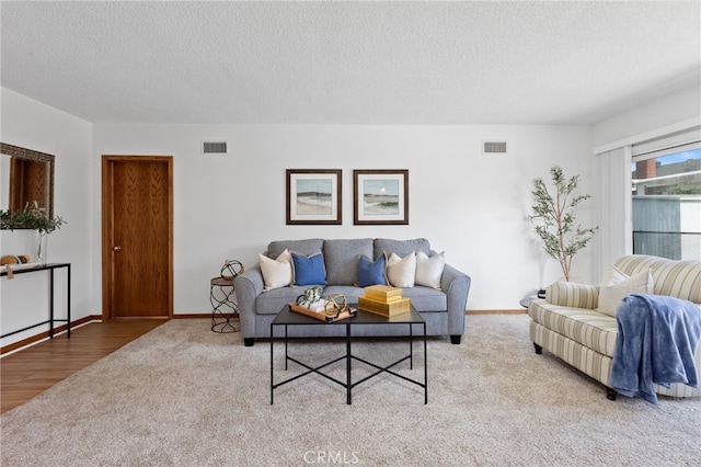 1907 W 235th Pl, Torrance, CA 90501 - carpeted living room with a textured ceiling