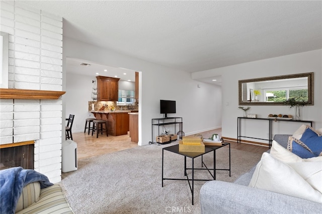 1907 W 235th Pl, Torrance, CA 90501 - living area featuring a brick fireplace and baseboards