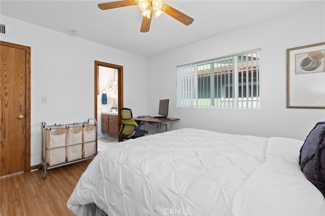 1907 W 235th Pl, Torrance, CA 90501 - bedroom featuring wood finished floors, ceiling fan, and ensuite bath