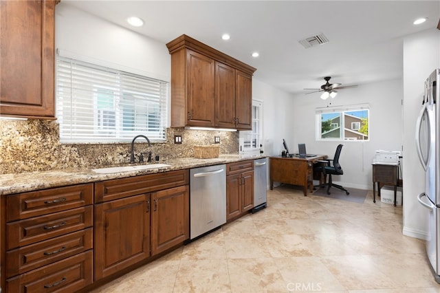 1907 W 235th Pl, Torrance, CA 90501 - kitchen featuring appliances with stainless steel finishes, tasteful backsplash, ceiling fan, light stone countertops, and recessed lighting