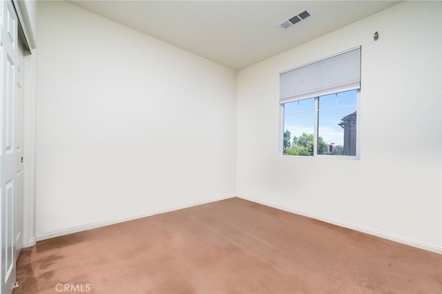 797 Plum Ln, Pomona, CA 91767 - empty room with carpet floors and baseboards