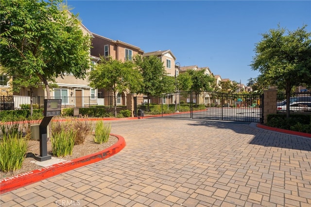 797 Plum Ln, Pomona, CA 91767 - view of home's community featuring a gate and a residential view