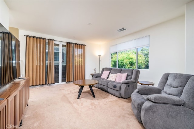 797 Plum Ln, Pomona, CA 91767 - living room featuring light colored carpet