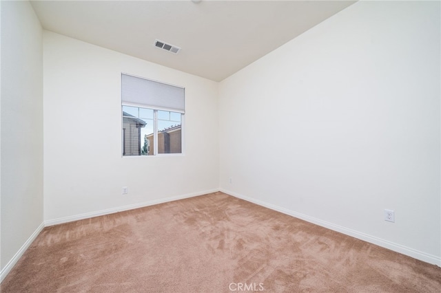 797 Plum Ln, Pomona, CA 91767 - unfurnished room featuring carpet floors and lofted ceiling