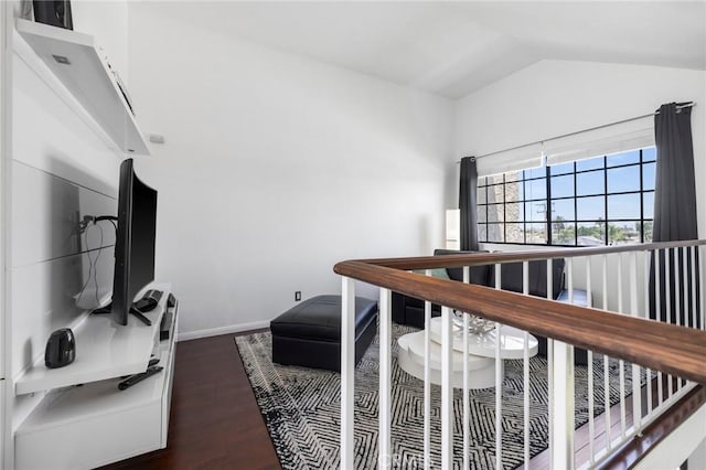 1237 E 6th St Unit 306, Long Beach, CA 90802 - bedroom with vaulted ceiling and dark wood-style floors