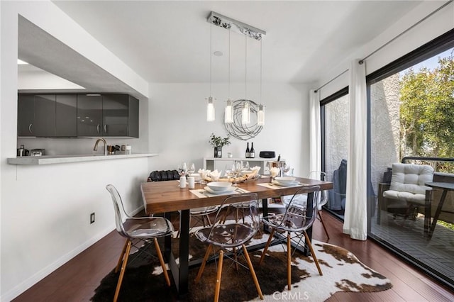 1237 E 6th St Unit 306, Long Beach, CA 90802 - dining space featuring wood finished floors