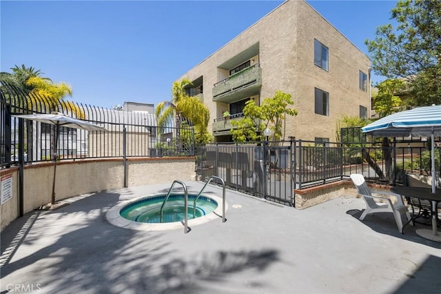 1237 E 6th St Unit 306, Long Beach, CA 90802 - view of swimming pool with a community hot tub and a patio area