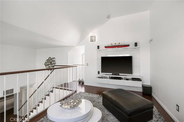 1237 E 6th St Unit 306, Long Beach, CA 90802 - living room featuring dark wood-type flooring and lofted ceiling