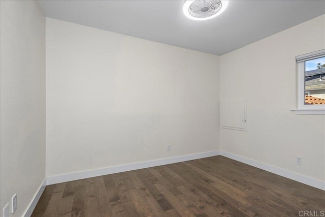 9858 Via Caceres, San Diego, CA 92129 - spare room with wood finished floors and baseboards
