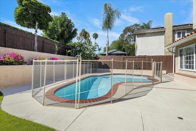 9858 Via Caceres, San Diego, CA 92129 - view of pool with a patio and a fenced backyard
