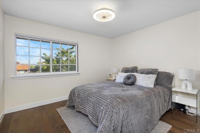 9858 Via Caceres, San Diego, CA 92129 - bedroom featuring baseboards and wood finished floors