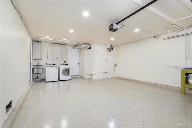 9858 Via Caceres, San Diego, CA 92129 - garage with washer and clothes dryer, recessed lighting, and a garage door opener