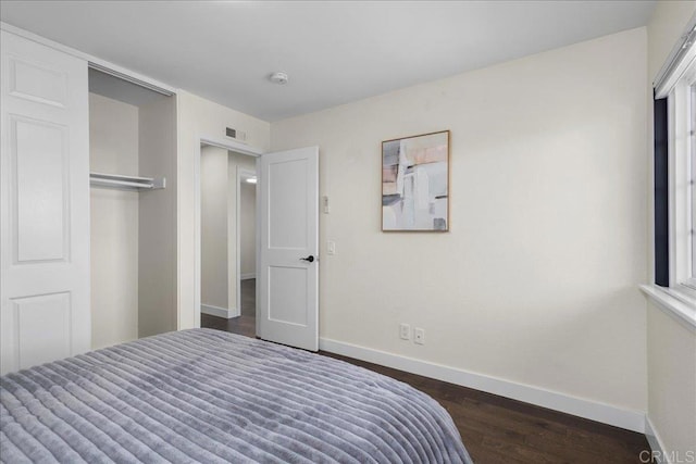 9858 Via Caceres, San Diego, CA 92129 - bedroom featuring baseboards and dark wood finished floors