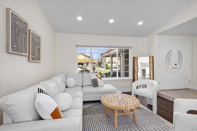 9858 Via Caceres, San Diego, CA 92129 - living room with lofted ceiling, wood finished floors, and recessed lighting
