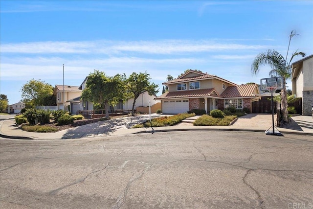 9858 Via Caceres, San Diego, CA 92129 - view of front of property featuring concrete driveway and a tiled roof