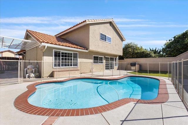 9858 Via Caceres, San Diego, CA 92129 - view of pool featuring a fenced backyard and a patio