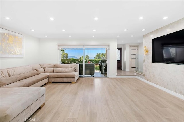 9436 Via Monique, Burbank, CA 91504 - living area with light wood-style flooring and recessed lighting