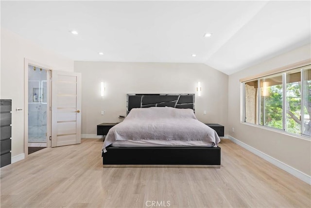 9436 Via Monique, Burbank, CA 91504 - bedroom featuring light wood finished floors, vaulted ceiling, and recessed lighting