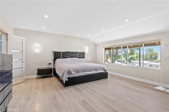 9436 Via Monique, Burbank, CA 91504 - bedroom featuring light wood finished floors, lofted ceiling, and recessed lighting