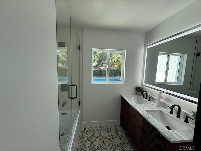 17532 Hamlin St, Lake Balboa, CA 91406 - full bathroom featuring double vanity, a shower with shower door, and a tub to relax in
