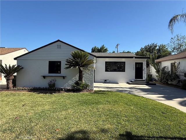 17532 Hamlin St, Lake Balboa, CA 91406 - bungalow with a front lawn, stucco siding, and concrete driveway