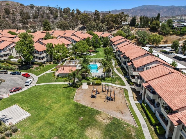 18165 Sundowner Way Unit 914, Canyon Country, CA 91387 - aerial perspective of suburban area with a mountainous background and a pool area