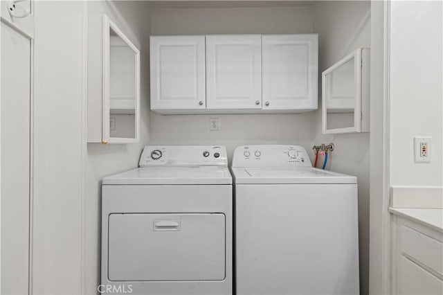 18165 Sundowner Way Unit 914, Canyon Country, CA 91387 - laundry area featuring cabinet space and washing machine and dryer