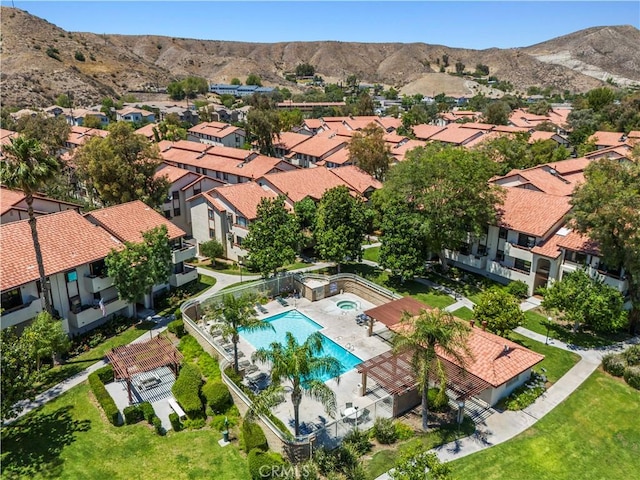 18165 Sundowner Way Unit 914, Canyon Country, CA 91387 - aerial perspective of suburban area featuring a pool and a mountainous background
