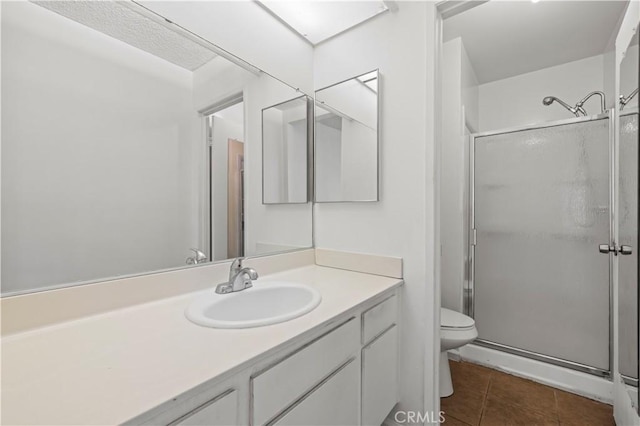 18165 Sundowner Way Unit 914, Canyon Country, CA 91387 - bathroom with a shower stall, vanity, and tile patterned flooring